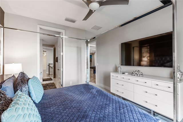 bedroom featuring connected bathroom and ceiling fan