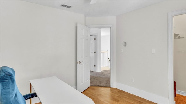 office area with wood-type flooring