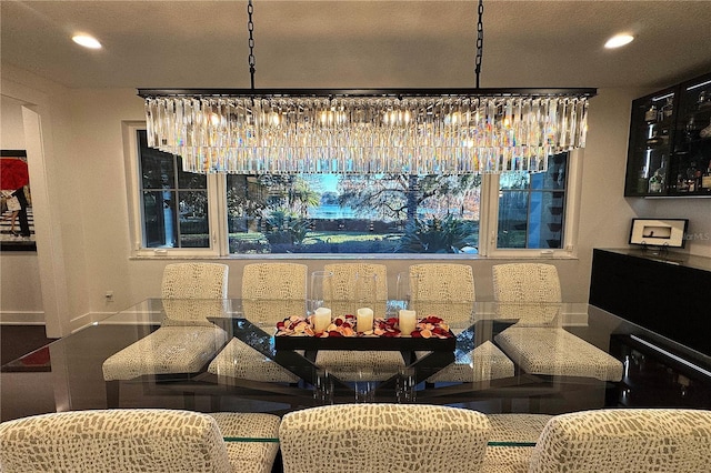 dining space with a chandelier