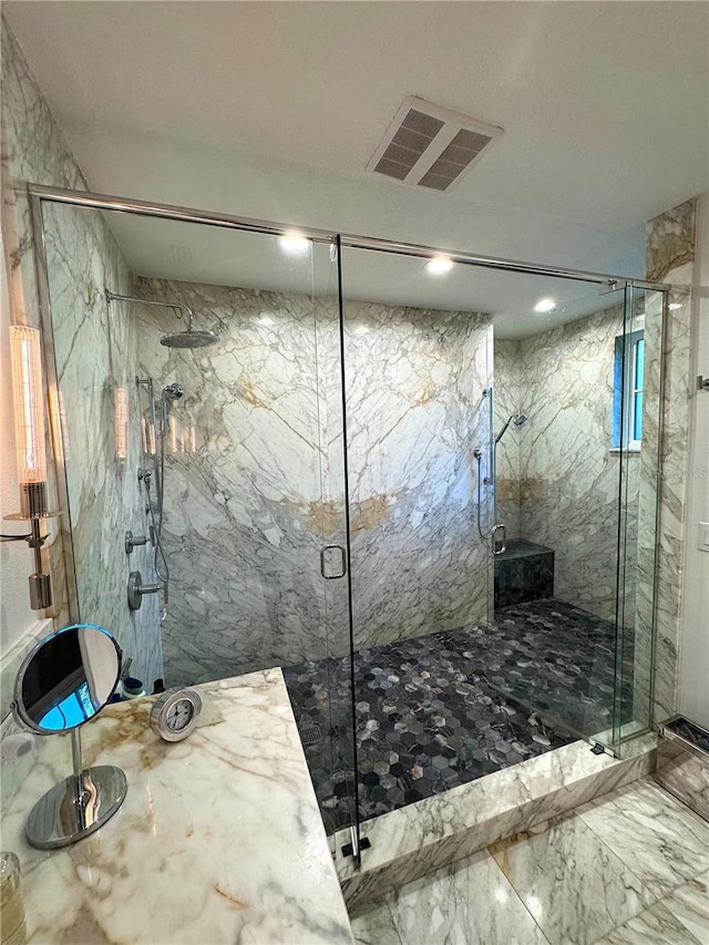 bathroom featuring walk in shower