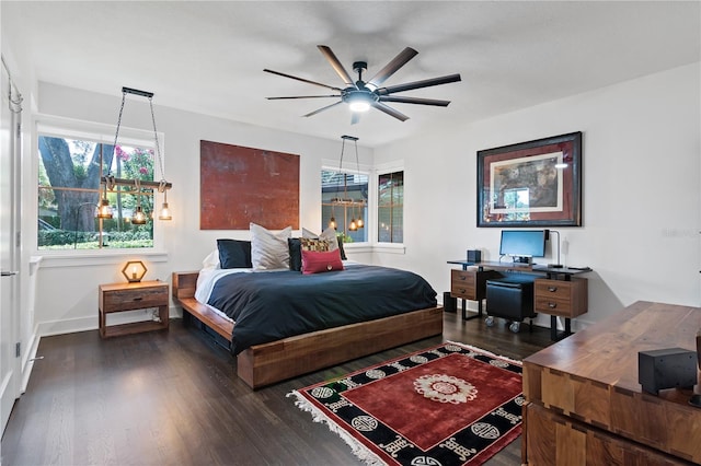 bedroom featuring dark hardwood / wood-style floors and ceiling fan