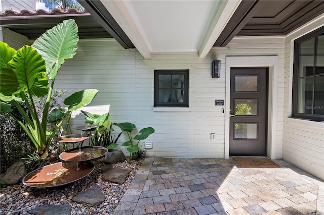 entrance to property with a patio area