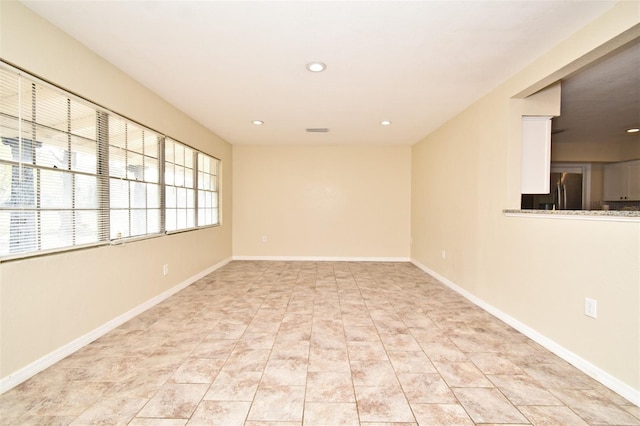 view of tiled spare room