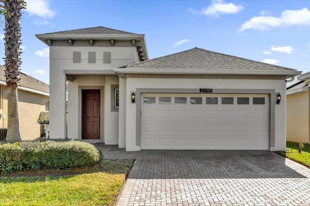 view of front of home with a garage