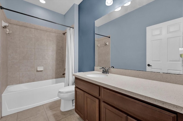 full bathroom featuring tile patterned flooring, vanity, shower / bath combination with curtain, and toilet