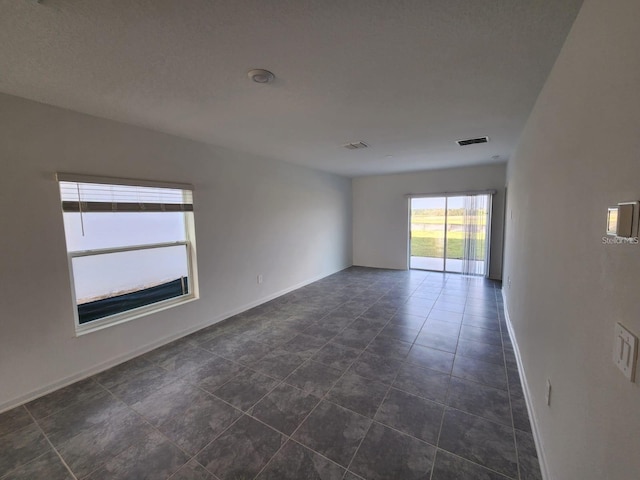 view of tiled empty room