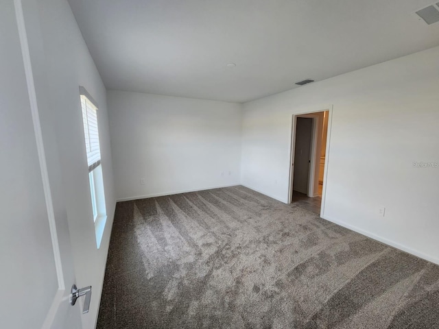 empty room with carpet floors