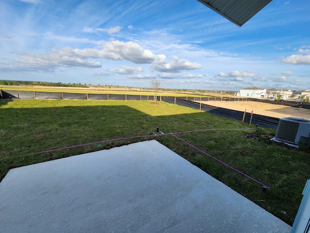 view of yard with central AC