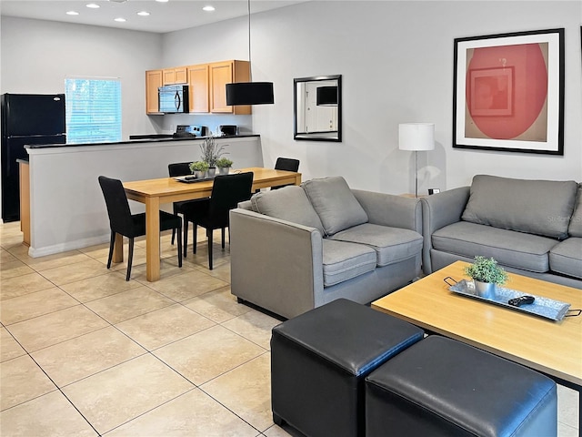 living room with light tile patterned floors