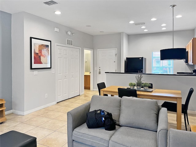 living room featuring light tile patterned floors