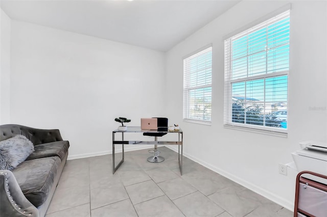 home office with light tile patterned floors