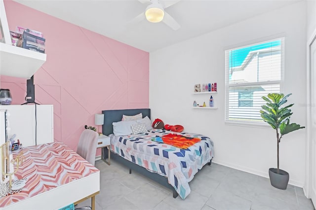 tiled bedroom with ceiling fan