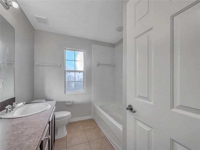 full bathroom with tile patterned flooring, vanity, shower / tub combination, and toilet