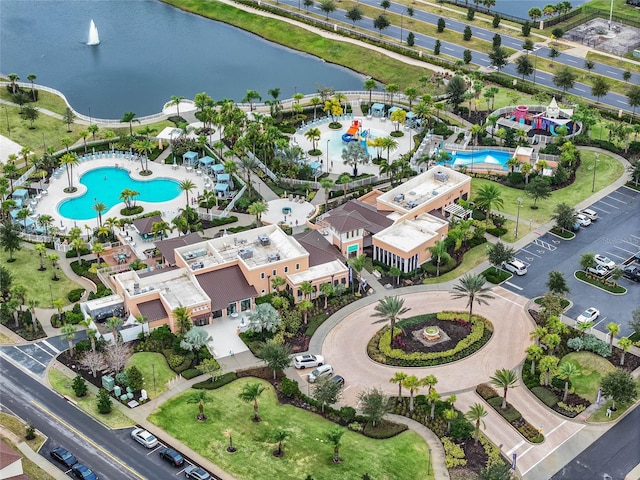 birds eye view of property featuring a water view