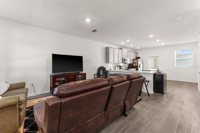 living room with light wood-type flooring