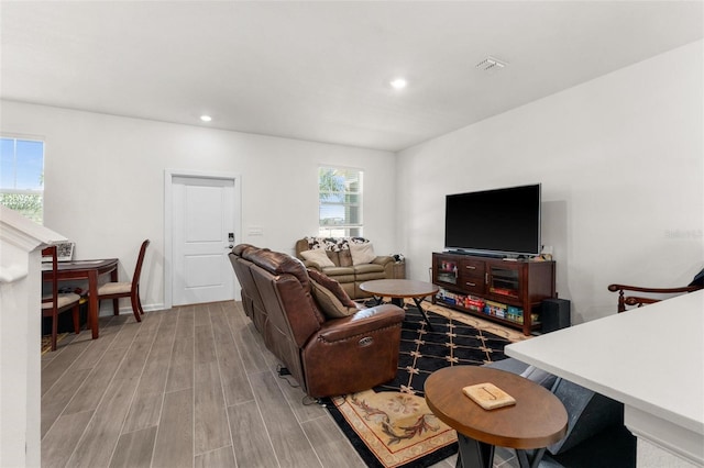 living room with light hardwood / wood-style floors