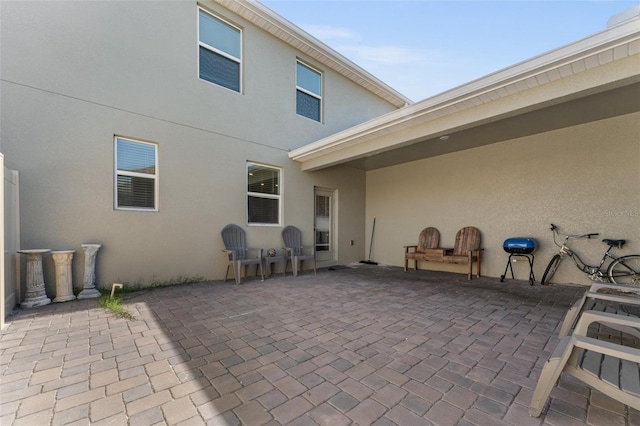 back of house with a patio area