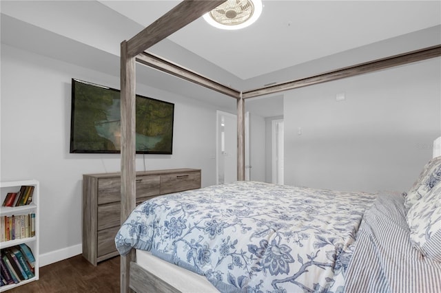 bedroom featuring dark hardwood / wood-style flooring