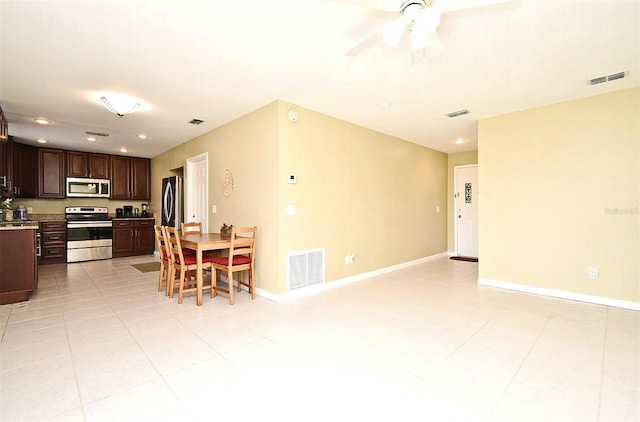 dining space with ceiling fan