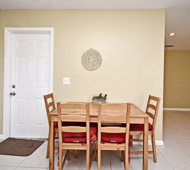 view of tiled dining space