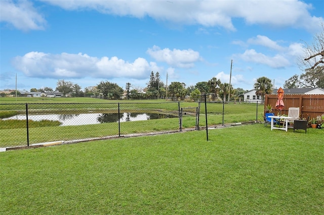 view of yard with a water view