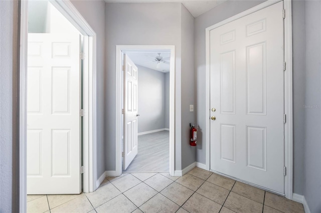 interior space with light tile patterned floors