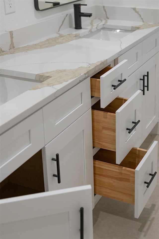 bathroom with sink and hardwood / wood-style floors