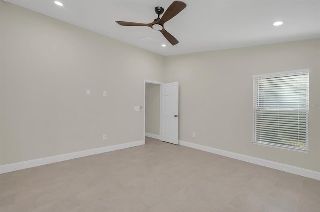 unfurnished room with ceiling fan