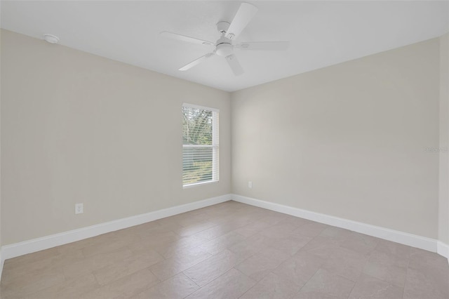 spare room featuring ceiling fan