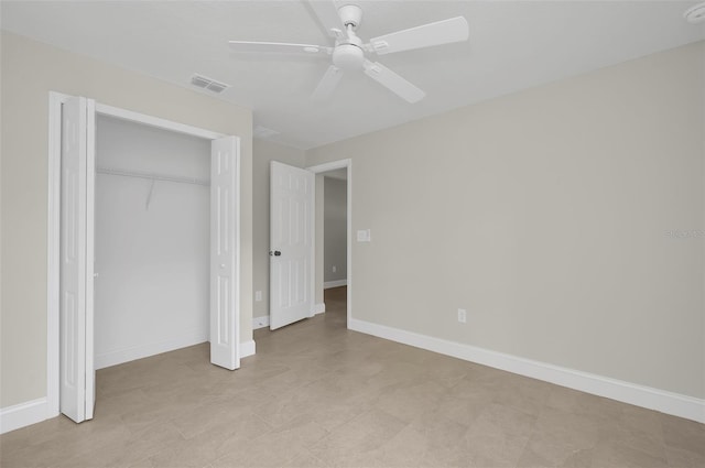 unfurnished bedroom featuring a closet and ceiling fan