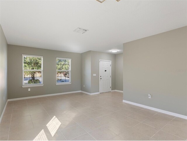 view of tiled spare room