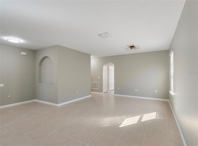 view of tiled empty room