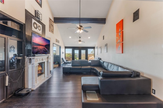 living room featuring beamed ceiling, high vaulted ceiling, and dark wood-type flooring