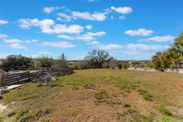 view of yard with a rural view