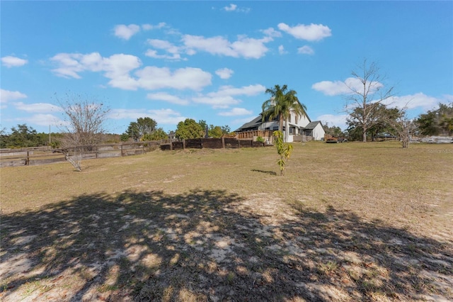 view of yard with a rural view