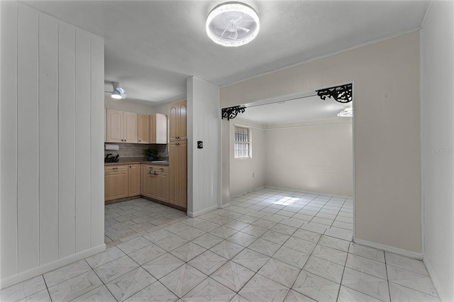 kitchen with decorative backsplash and light brown cabinets