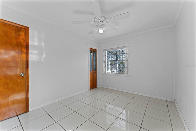 unfurnished room featuring light tile patterned floors, crown molding, and ceiling fan