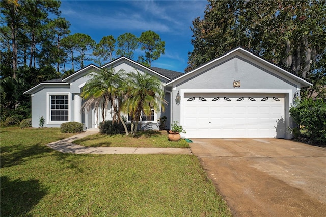 ranch-style home featuring a garage and a front yard