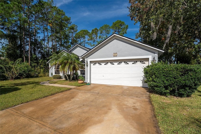 ranch-style house with a garage and a front lawn