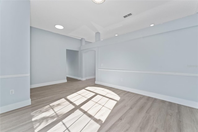 unfurnished room featuring light hardwood / wood-style flooring