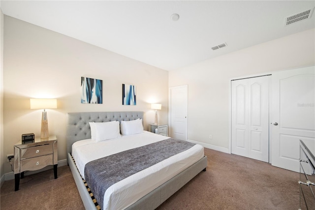 bedroom with carpet floors and a closet