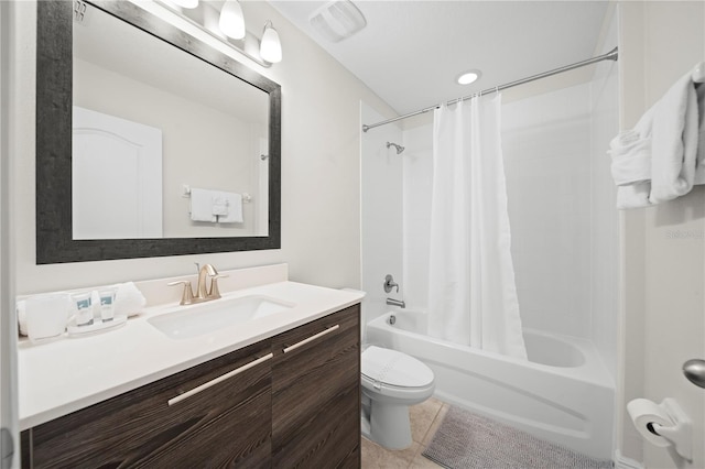 full bathroom with vanity, shower / bathtub combination with curtain, tile patterned floors, and toilet