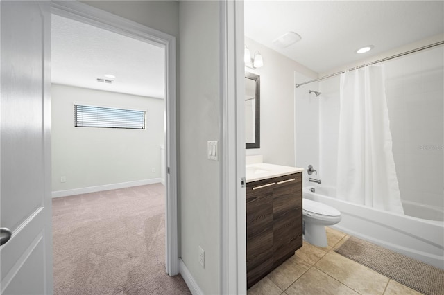 full bathroom featuring shower / tub combo with curtain, vanity, toilet, tile patterned floors, and a textured ceiling