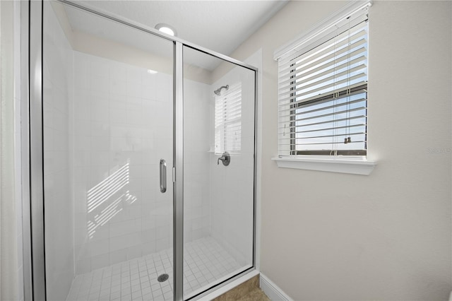 bathroom featuring walk in shower