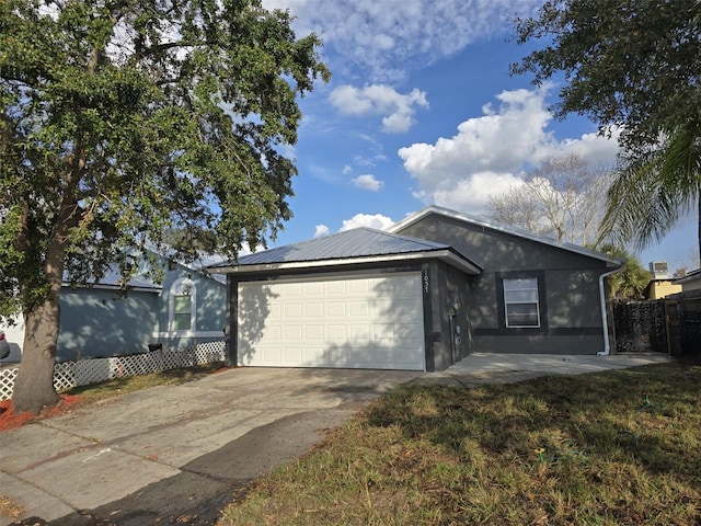 view of front of home with a garage