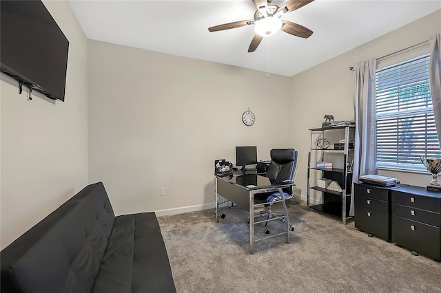 office space with light colored carpet and ceiling fan