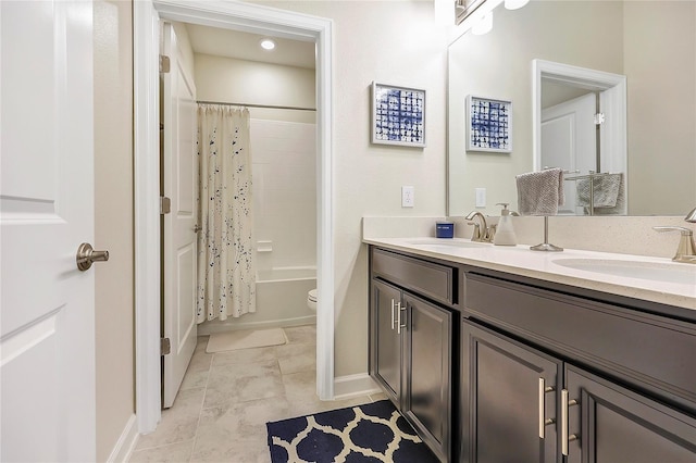 bathroom featuring vanity and shower / bathtub combination with curtain