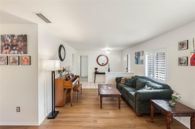 living room featuring light wood-type flooring