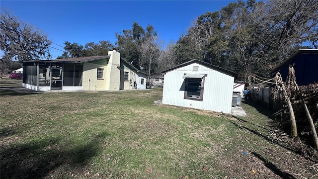 view of property exterior with a sunroom and a lawn