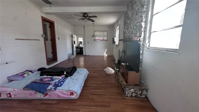 living room featuring dark hardwood / wood-style floors and ceiling fan